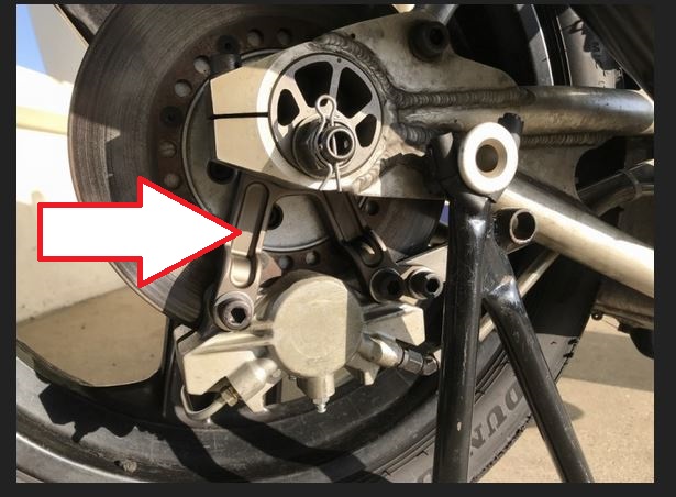 rear caliper and mount.JPG