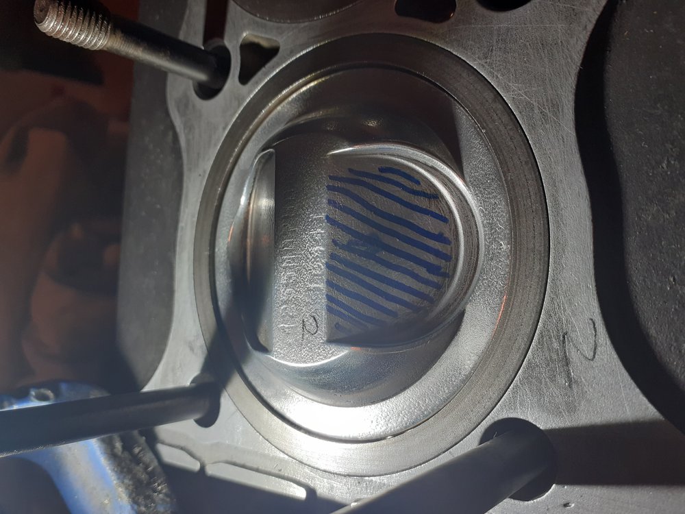 Wiseco cut exhaust pocket.jpg