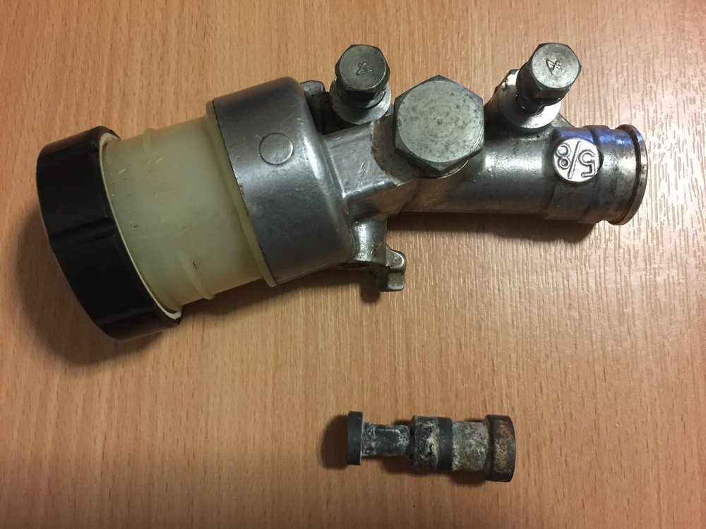 Rear Master Cylinder - Old Piston.JPG